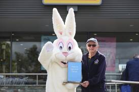 Bill Sleep with the Easter Bunny ahead of their annual fundraiser for Lion's Childhood Cancer Research Foundation. Picture by Luke Hemer 