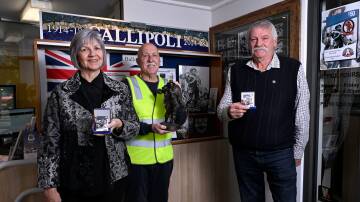 Bull's children Eleanor Johnson (left) and Leslie Allen (right) pictured with Phil Carter, Veteran Advocate of the Ballarat RSL. Picture by Kate Healy