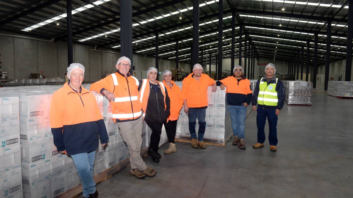Kaye Shepherd, Ross Williams, Jackie Jelly, Vikki Leathan, Tony Chandler, Sidhant Kanwar and Thanh Le from Cottonwood Springs in the new factory. Picture: Kate Healy