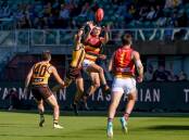 Adelaide Crows' Ben Keays flies for a mark when playing against Hawthorn at UTAS Stadium in Launceston in 2023. Picture by Phillip Biggs