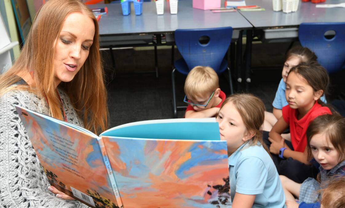 Jodi Toering reads her first book Mallee Sky to children after it was published in 2019. Picture by Lachlan Bence