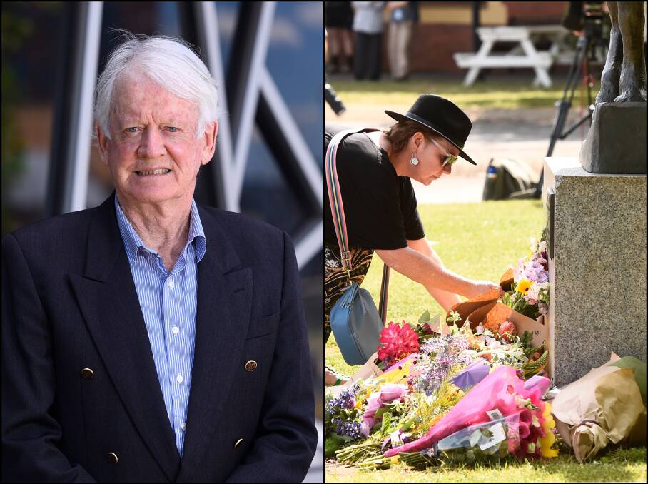 Donal Gibb (left) and a woman laying flowers at a vigil in Daylesford following Sunday's crash. File picture