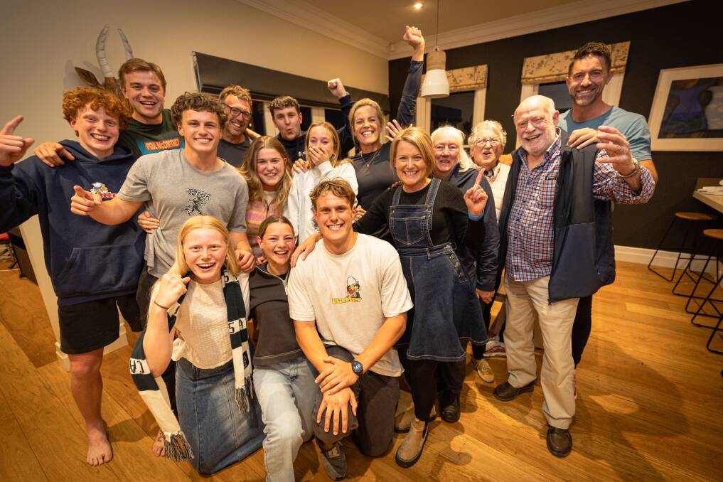 George Stevens (front, centre) celebrates his draft moment with family on Tuesday. Picture by Sean McKenna