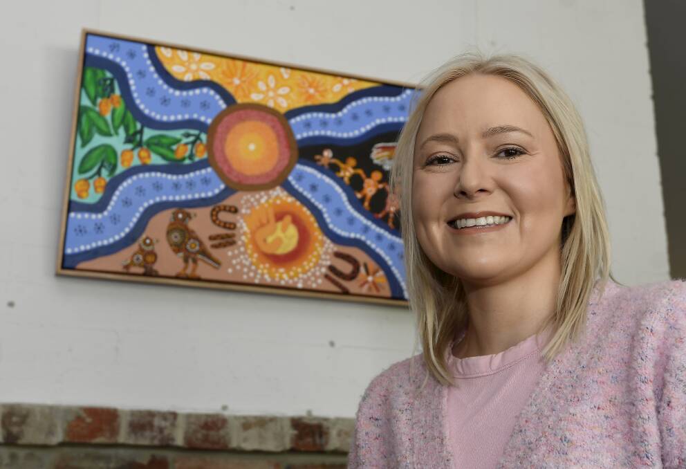 Wadawurrung traditional owner and artist Jenna Oldaker has four pieces on display as part of the Wadawurrung Traditional Owners Aboriginal Corporation's first ever art show. Picture by Lachlan Bence.