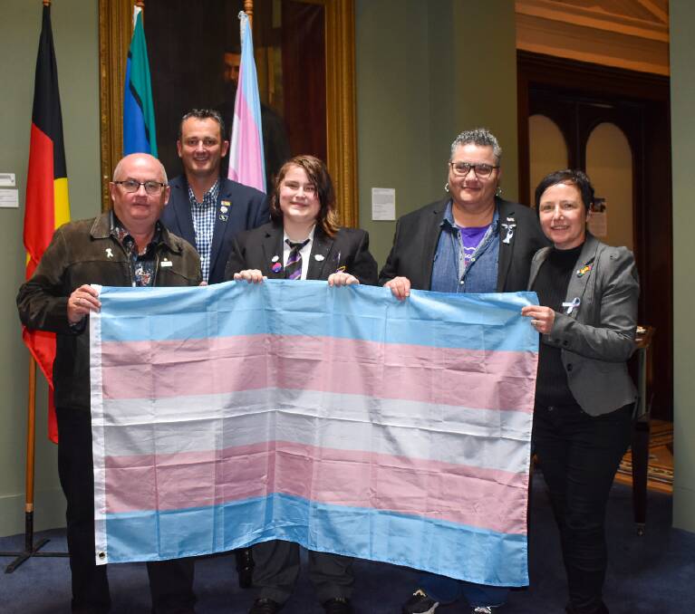City of Ballarat mayor Cr Des Hudson, Cr Daniel Moloney, Phoenix P-12 Community College student Remi Turkovic, A Place At The Table organiser KL and Cr Belinda Coates commemorate Trans Awareness Week. Picture by City of Ballarat.