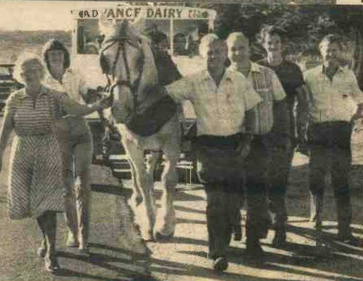 Two generations of the McCann family comprising mother Amy McCann, daughter Glenda Fraser, father Arthur McCann and sons Malcolm and Trevor McCann alongside Smokey, the last horse to deliver milk by cart in 1981. Picture by The Courier. 