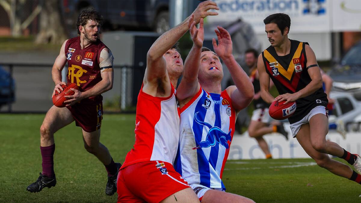 (L-R) Redan's Pat Fitzgibbon, Marcus Powling (Ballarat) and Bryson McDougall (East Point), Michael Culliver of Bacchus Marsh. Pictures by Lachlan Bence
