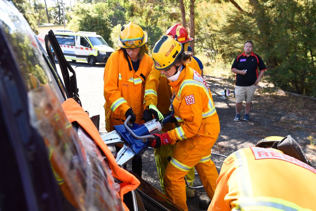 Caitlin Weppner 15 using the jaws of life at the Creswick School of Forestry carpark with instruction from Kayla Manning of Daylesford CFA. Picture by Adam Trafford. 