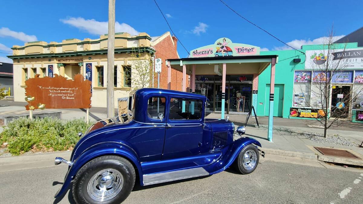 Dennis and Cheryle's iconic Ford hot rod outside the Inglis Street Ballan diner. Picture by Gabrielle Hodson. 