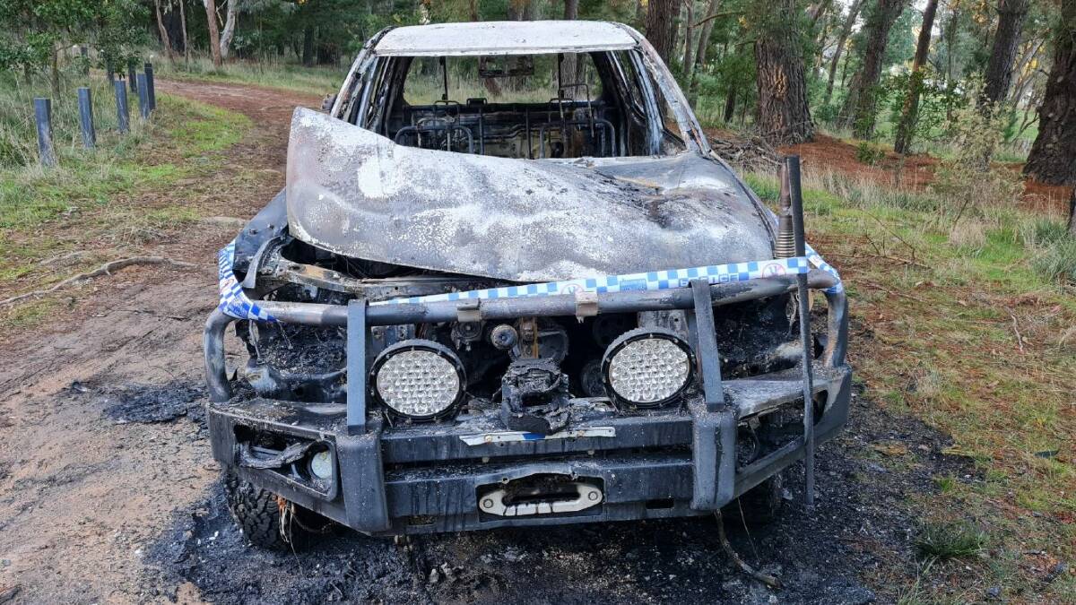 Firefighters were called to the burning Mitsubishi dual-cab ute in Pryor Park before dawn on Wednesday. Picture by Gabrielle Hodson.