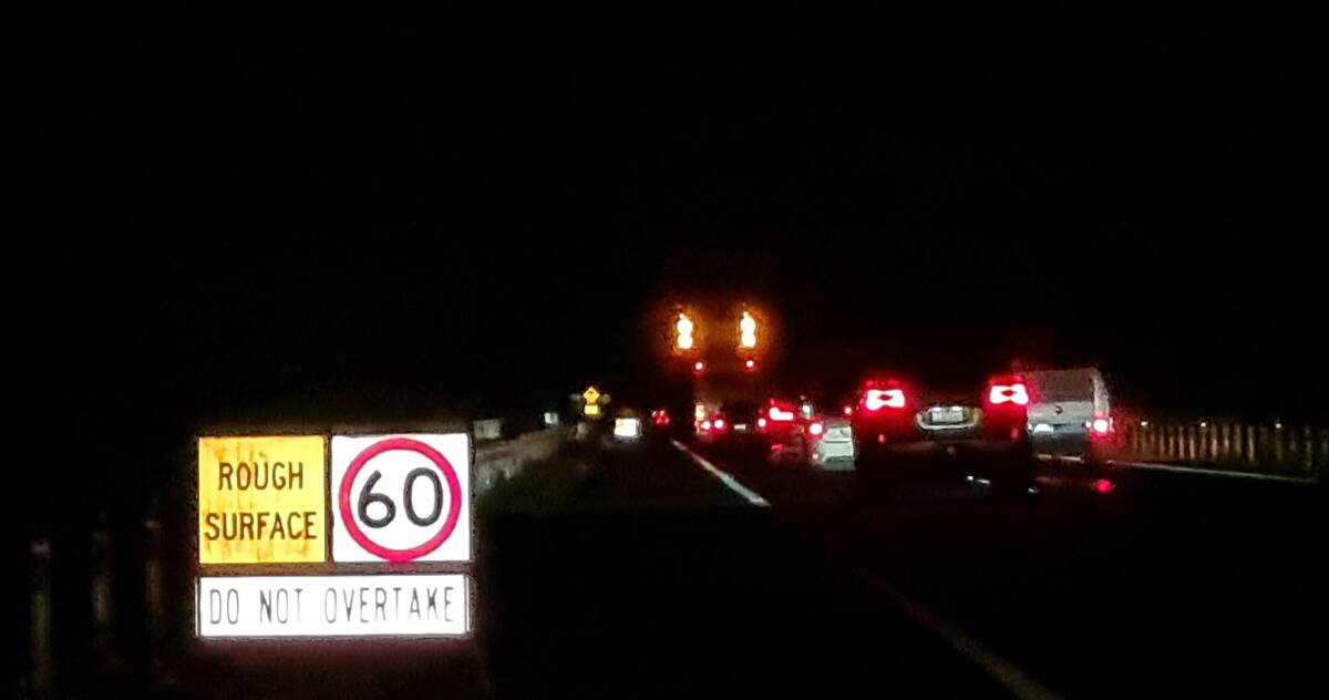 Black ice warning lights near a damaged section of the freeway between Gordon and Ballan. Vehicles are asked to slow to 40kmh. Picture supplied