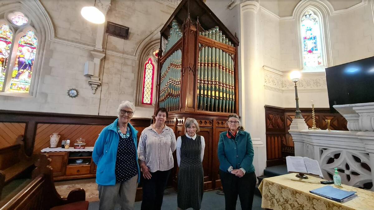 Carngham Uniting Church elder Sue Whiteley with chair Kaylene Baird, Organs of the Ballarat Goldfields festival Director Judy Houston and elder Kaye Draffin with their rare pipe organ, purpose-built for the 1892 church. Picture by Gabrielle Hodson.
