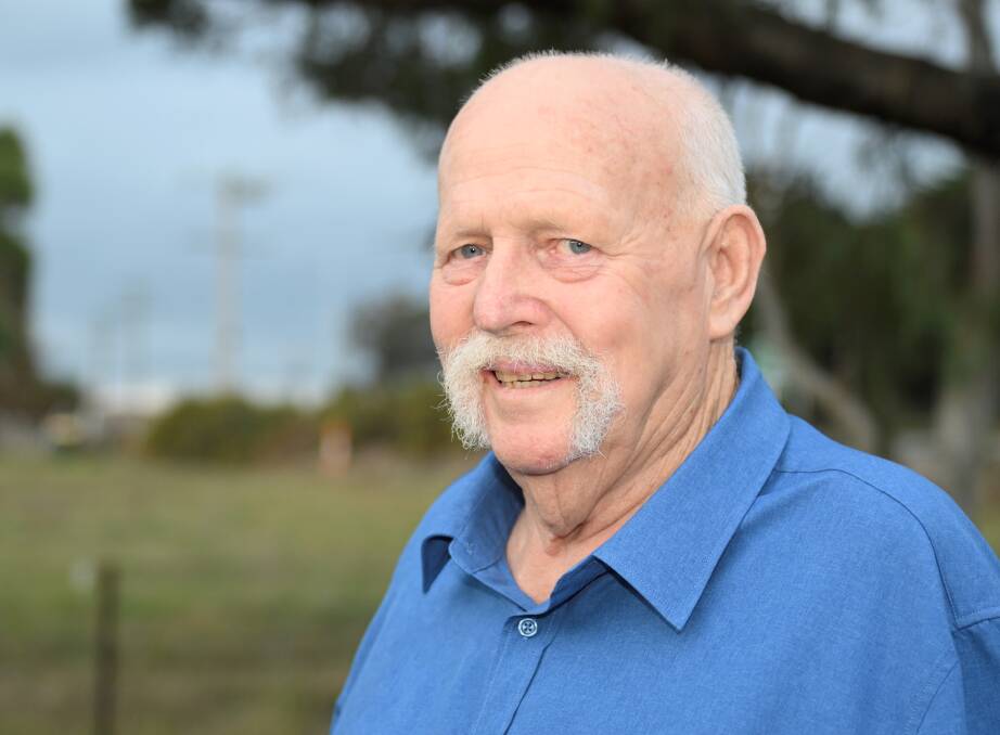 William Dobell in his garden on June 5, 2024. He will be honoured with an OAM on the King's Birthday weekend for his tireless work for veterans. Picture by Lachlan Bence