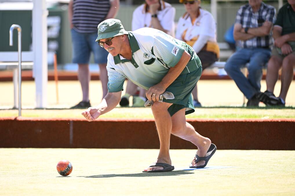 Colin Young of Webbcona bowls in the match against City Oval. Picture by Adam Trafford