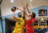 Tyler Rudolph of the Miners in action against former Ballarat Miner Jock Perry
in the NBL1 South league match between Ballarat Miners and Diamond Valley Eagles at Selkirk Stadium. Picture by Adam Trafford