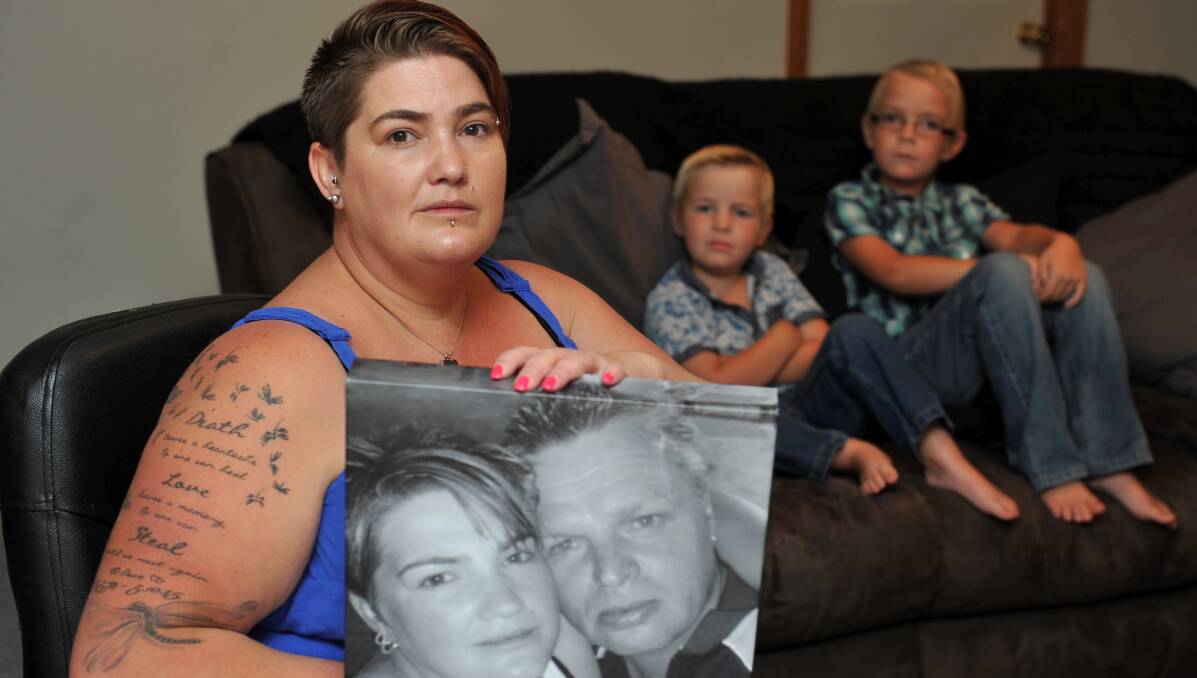 GONE: Rebecca Waight, with 4-year old son Nate Laxton and 7-year- old son Daynon Laxton, wants the stigma to end. Picture: Lachlan Bence.