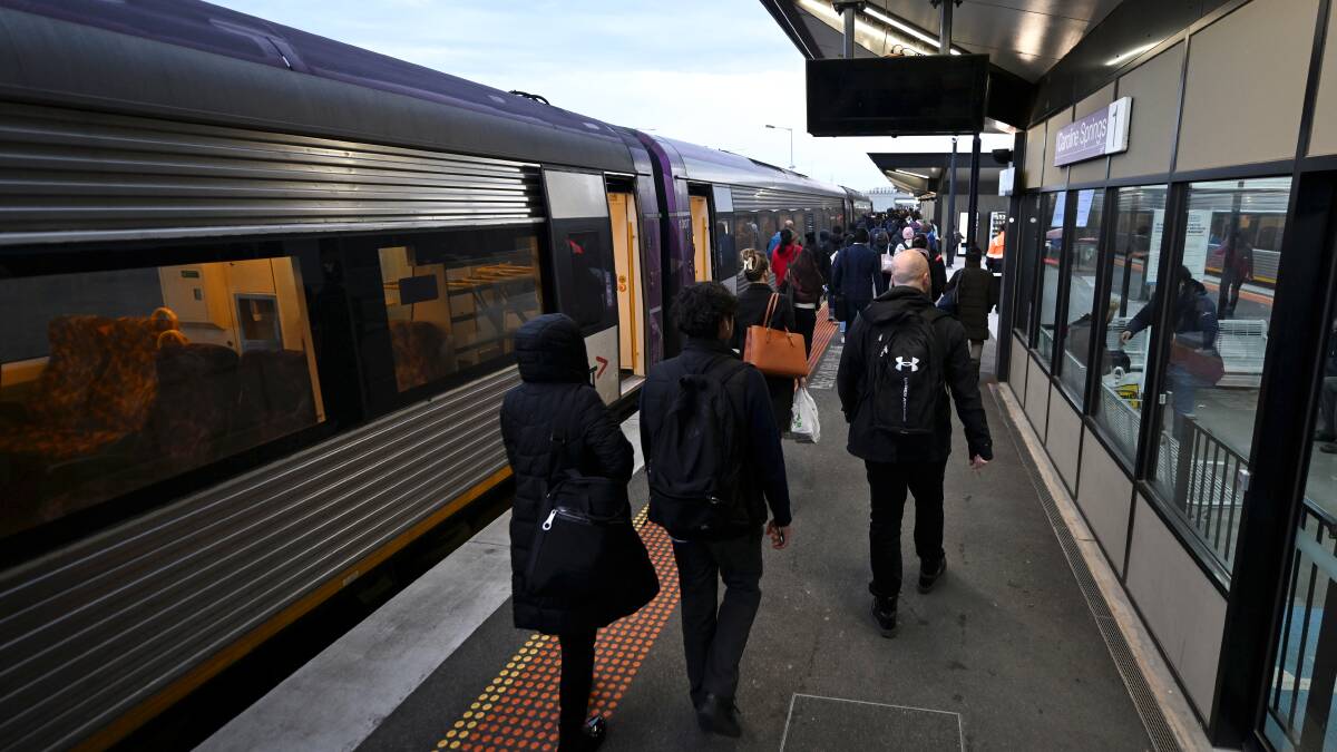 Ballarat commuters disembark the train at Caroline Springs Station. Picture: Lachlan Bence. 