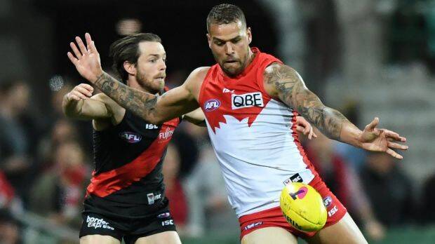 Marksman: Lance Franklin shoots for goal during a dominant performance. 