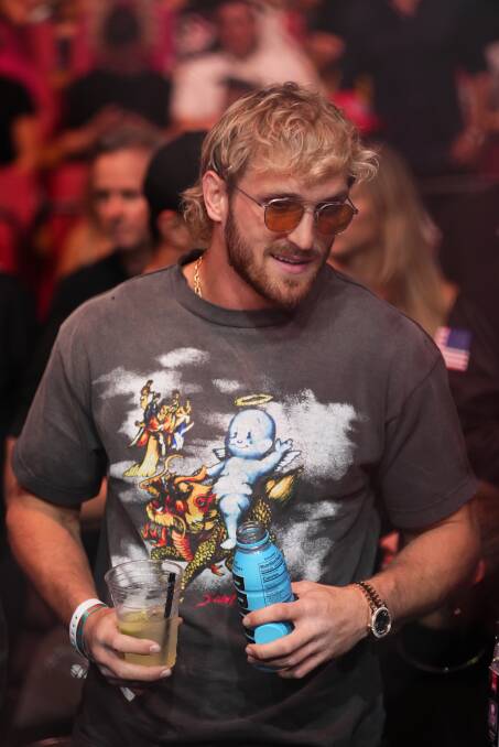 Influencer Logan Paul, who is wigned to professional wrestling company WWE, is seen with his Prime in hand for an UFC event in Miami in April. Picture Getty Images