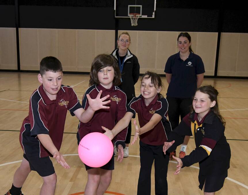 Delacombe Primary School grade five pupils Mason, James, Lexi and Zahlia get involved in a game of dodgeball under mentorship of Sports Central's Sabelle McSparron and Holly Jeffrey. Picture by Lachlan Bence