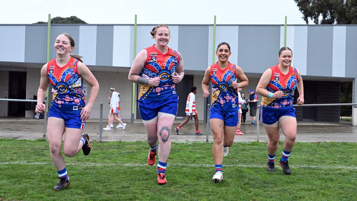 East Point's Sammy Stephens (second from right) says it is a proud honour to see her design come to life as she runs out with teammates Georgia Deloas-Chapple, Jessie Cartledge and Issie Terry on Sunday, May 19, 2024. Picture by Kate Healy