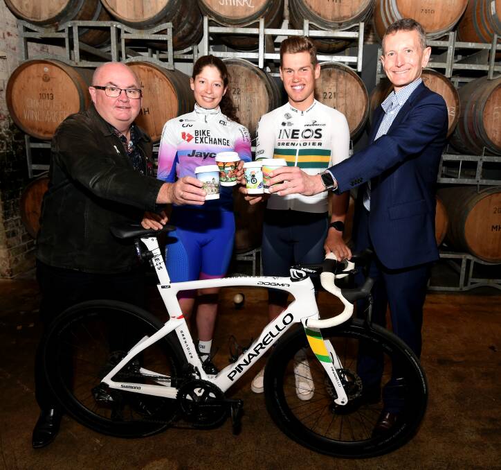 City of Ballarat mayor Des Hudson, Australian champions Ruby Roseman-Gannon and Lucas Plapp and Federation University vice-chancellor Duncan Bentley toast the AusCycling Road National Championships return to Ballarat. Picture by Lachlan Bence