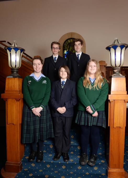 VOCAL: Ballarat High's Laura Benney and Gabby Ward, with St Patrick's College's Matthew Duffy, Max Wakefield and Oscar Grigg relish public speaking. Picture: Kate Healy