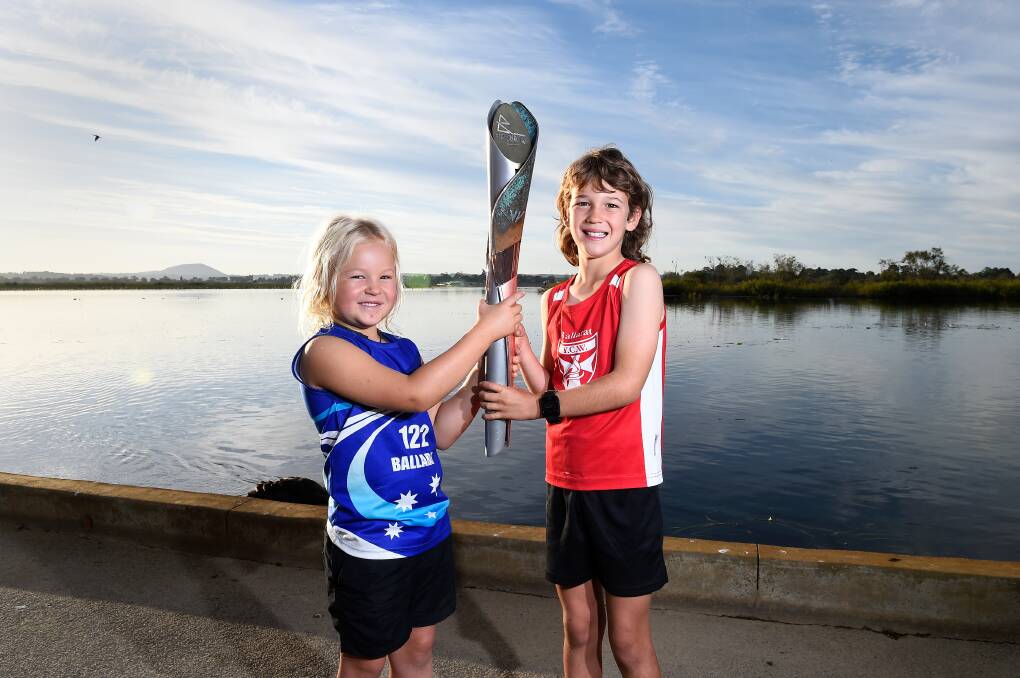 Junior Ballarat athletes Indy and Cooper left to hold the baton amid the excitement leading up to the 2022 Birmingham Commonwealth Games, a month before Regional Victoria was called into play. Picture by Adam Trafford