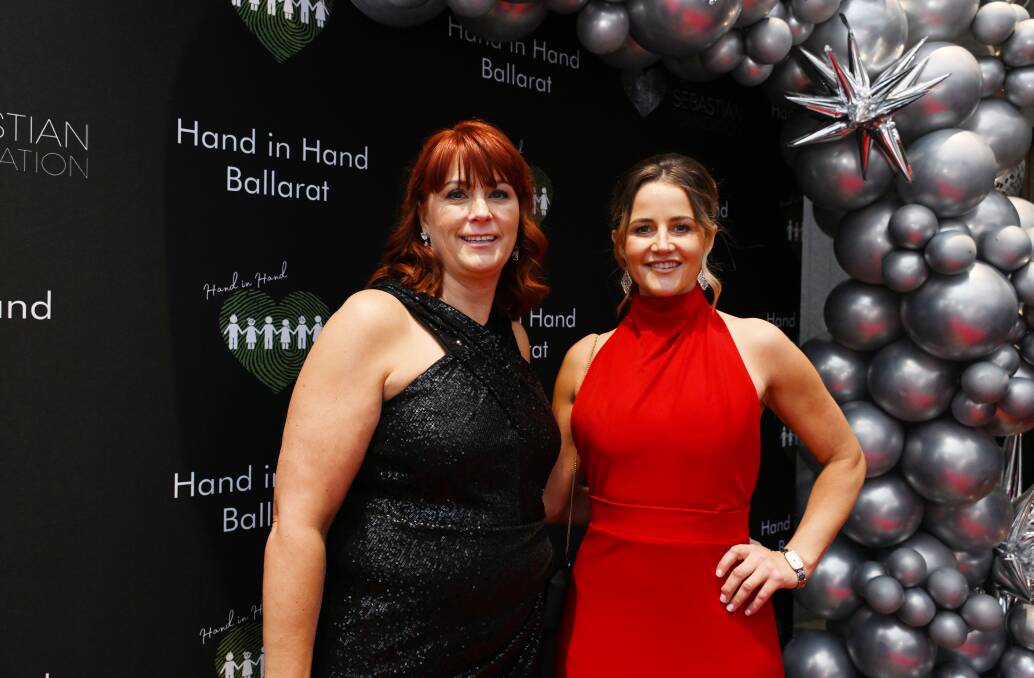 Hand In Hand founder Leah Ashton with special guest, Melbourne Cup winning jockey Michelle Payne for the second annual gala ball. Picture by Kate Healy