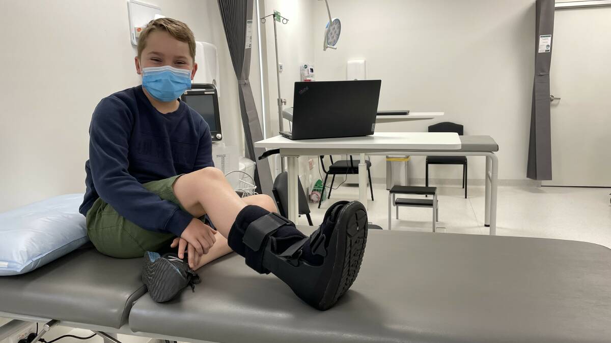 Ten-year-old Henry says he did not have to wait long for treatment on his "blue and wonky" toe, which turned out to be broken. Picture by Melanie Whelan