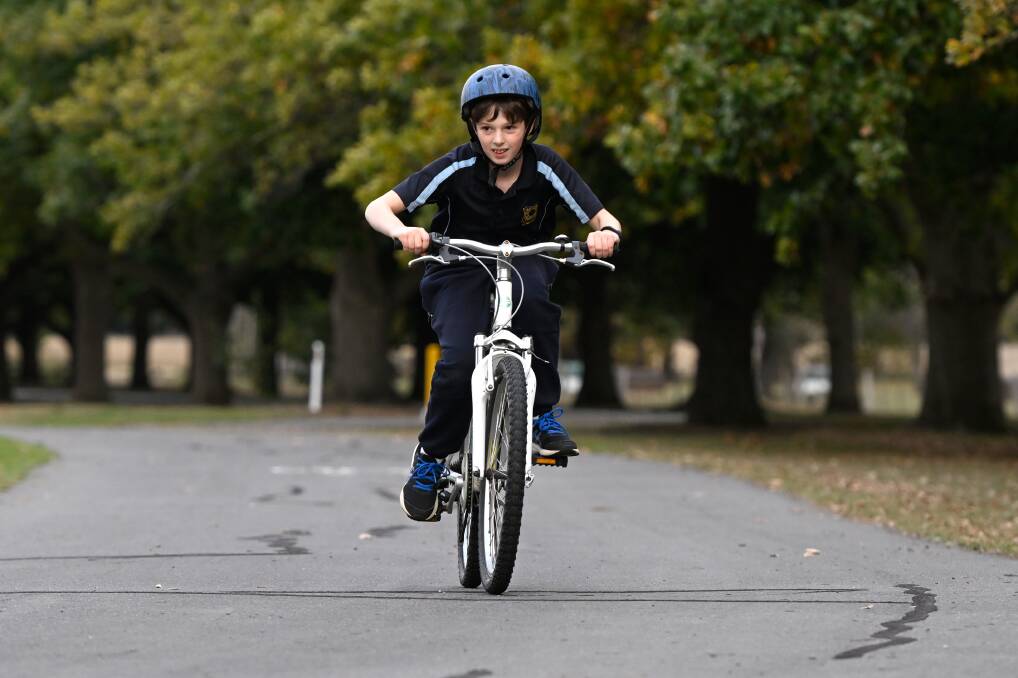 Darcy Pastore has been building skills and confidence in the Power2Pedal program for Ballarat children with autism to learn to ride in Victoria Park. Picture by Adam Trafford