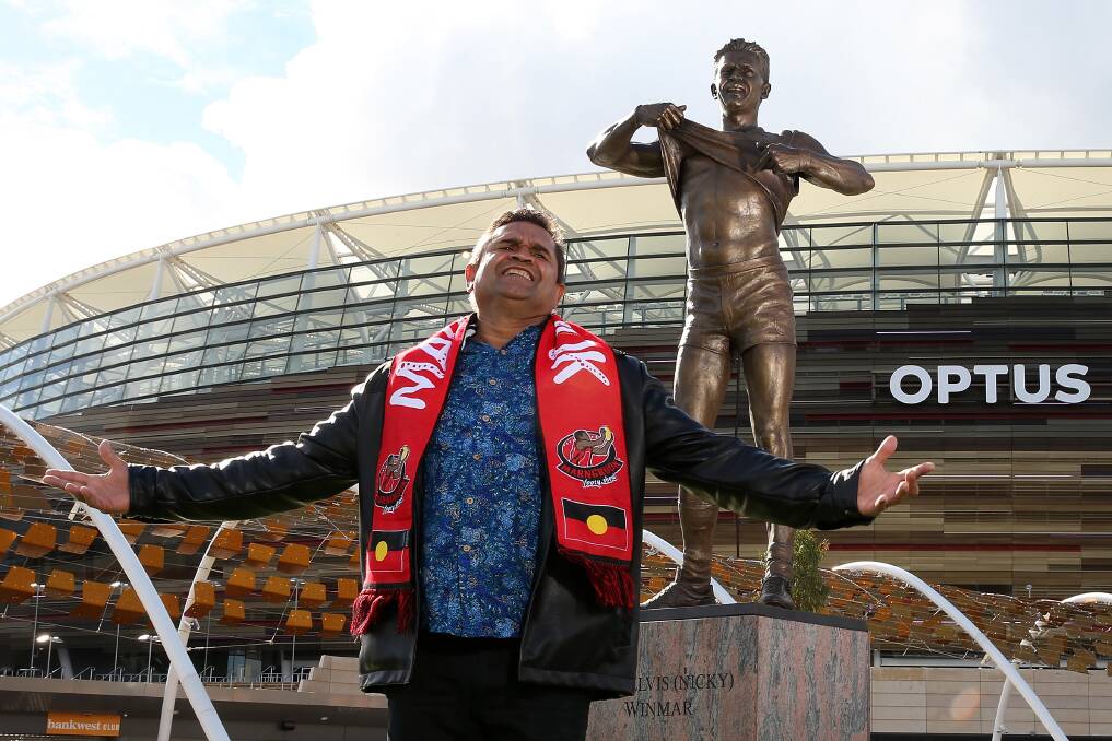 The story behind Nicky Winmar's iconic pose, now immortalised in a statue at Perth's Optus Stadium, has been evolving and become bigger with time. Picture by Getty Images