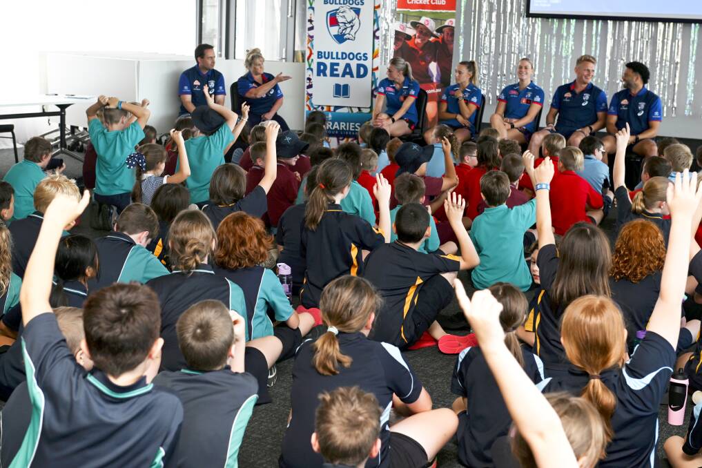 Western Bulldogs footballers Kristie-Lee Weston-Turner, Rylie Wilcox, Heidi Woodley and Jason Johannisen talk books with more than 150 pupils on February 22, 2024. Picture by Lachlan Bence