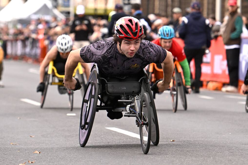 Paralympic prospect Sam Rizzo leads out a strong line-up in the Ballarat Marathon festival's 10-kilometre wheelrace. Picture by Adam Trafford
