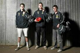 Redan footballer Isaac Smith with Daniel Ross-Smith (North Ballarat City) and Sam Harkin (Ballarat Swans) ahead of their BFL interleague debuts in 2010. Smith became an AFL draftee later that year. 