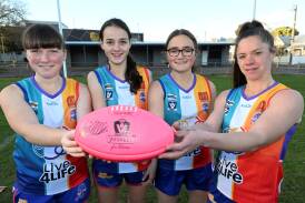 East Point Dragons Keisha Darroch (under-18s), Annie Earl (under-14s), Willow Klaver (under-16s) and Rebecca Piper (seniors) are uniting to promote grassroots youth suicide prevention program Live4Life and female mental health on and off the ground. Picture by Lachlan Bence