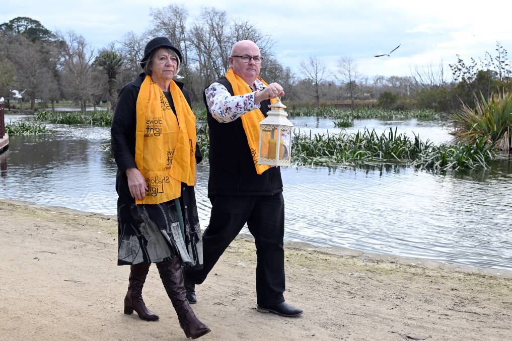 Ballarat and District Suicide Awareness Network's Annette McKenzie and Des Hudson walk for hope ahead of the annual Out of the Shadows walk to remember loved ones lost in September. Picture by Kate Healy