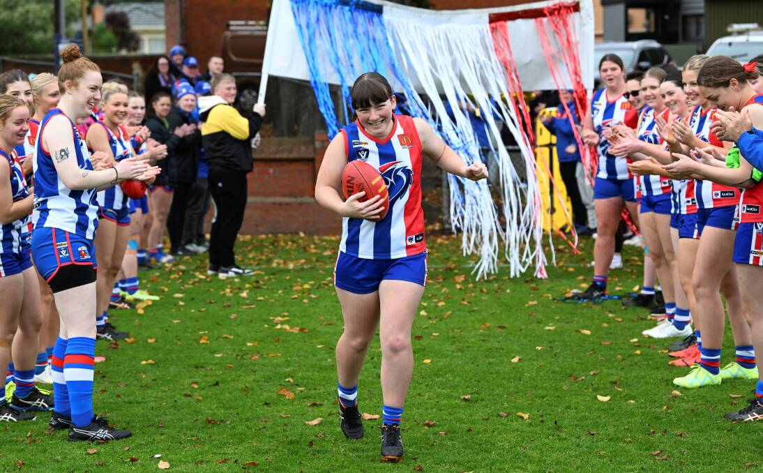 East Point under-19 girls captain Keisha Darroch celebrates becoming the club's first female player to reach 100 games on Sunday, May 19, 2024. Picture by Lachlan Bence