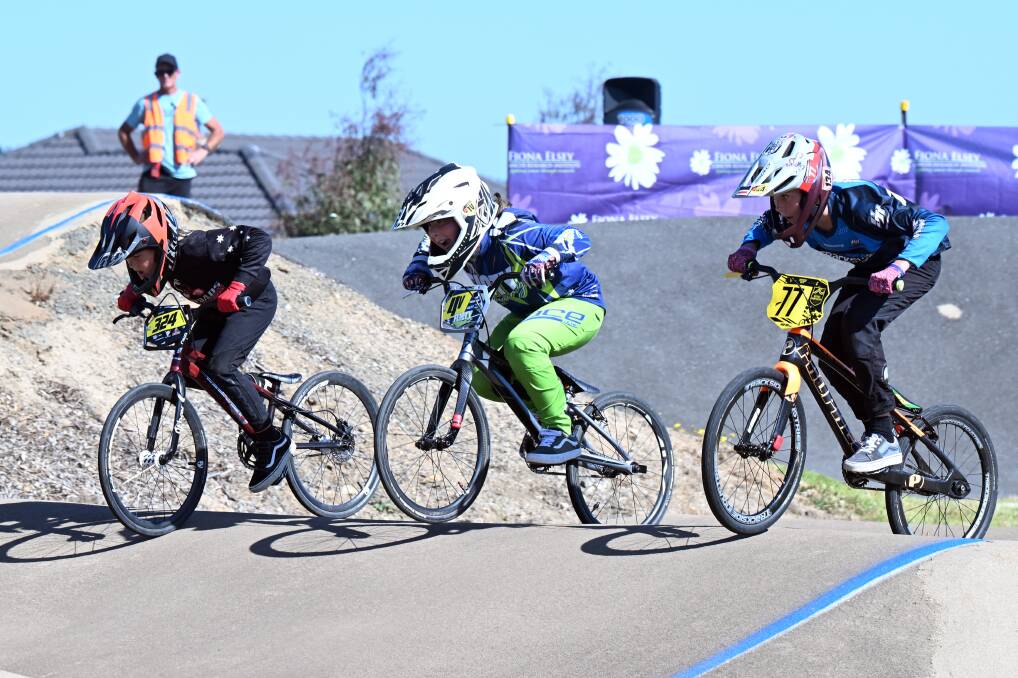Ballarat-Sebastopol BMX racer Murphy Cooper has the edge on Sunbury's Lincoln Feist and Warrnambool's Hamish Rush in the inaugural Ballarat Cycle Classic BMX competition. Picture by Kate Healy
