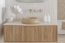Choose tiles for an Indonesian-inspired bathroom that resemble natural stones. Picture from Beaumont Tiles. 