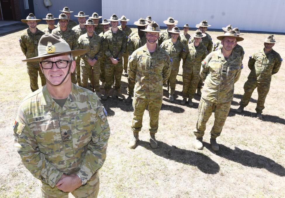 Attention: Lieutenant General Rick Burr, chief of the army, meets members of 8th/7th Battalion, Royal Victoria Regiment. Picture: Lachlan Bence