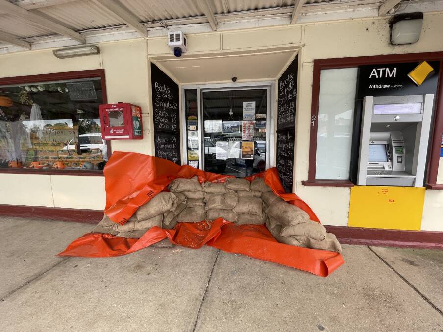 Businesses in Skipton prepare sandbags ahead of higher flood waters expected on Friday afternoon. Pictures by Luke Hemer