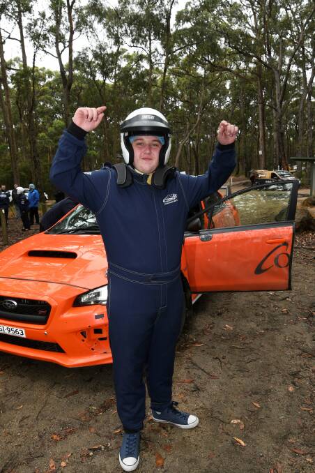 FUN TIMES: Ballarat teenager Tom Yeoman celebrates completing a hot lap around the Eureka Rally track. Picture: Lachlan Bence