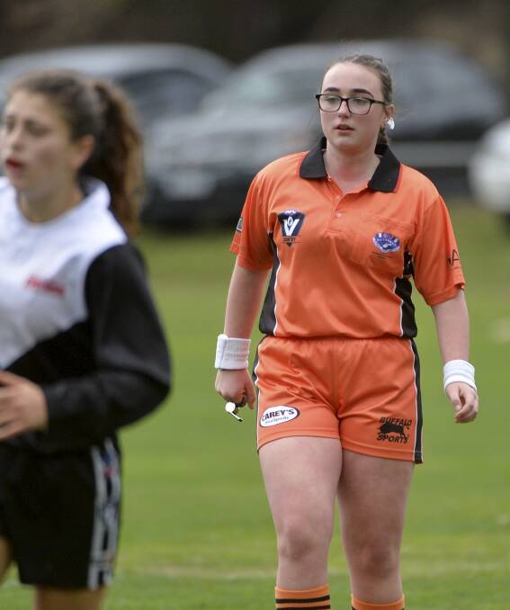 In control of the game: Fourteen-year-old Maeve Clark holds the whistle in the youth girls contest between North Ballarat City and Redan on the weekend.  Picture: Dylan Burns.