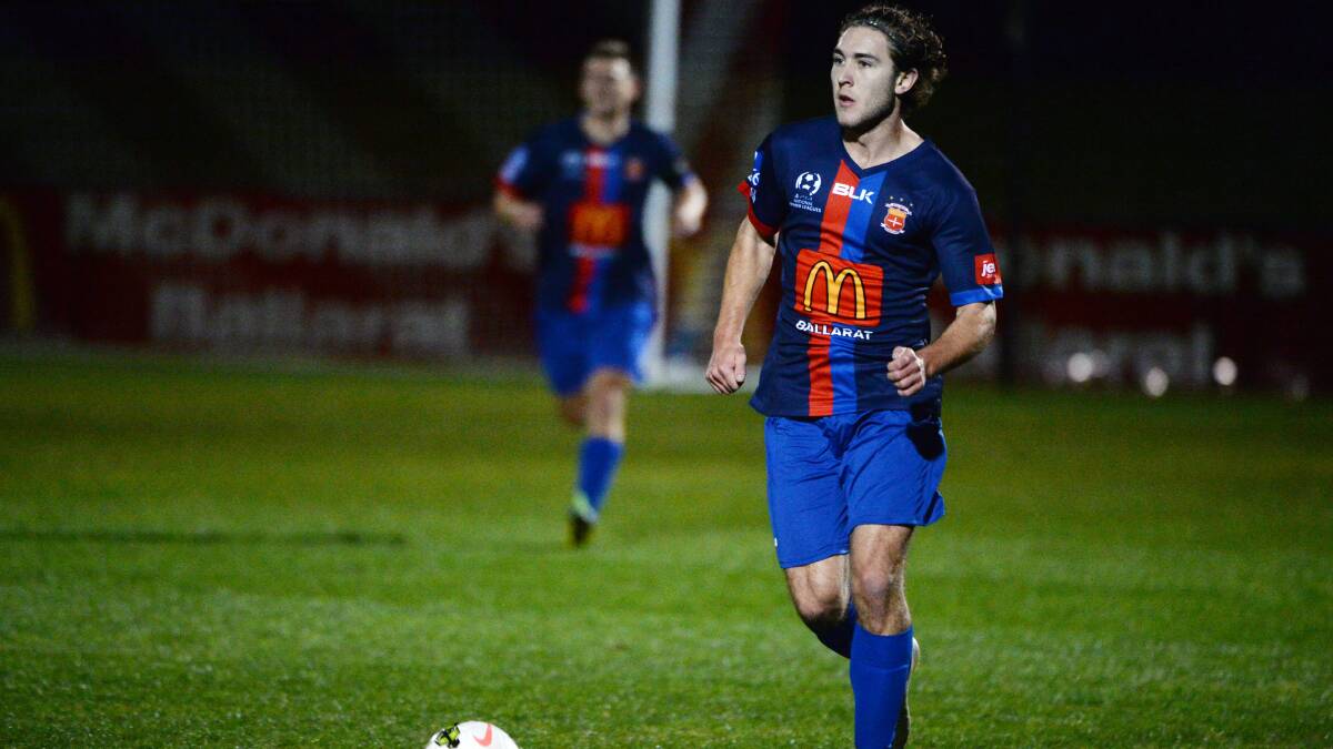 Daniel Tinker in action for the Red Devils against Whittlesea on Saturday night.  Picture: Kate Healy.