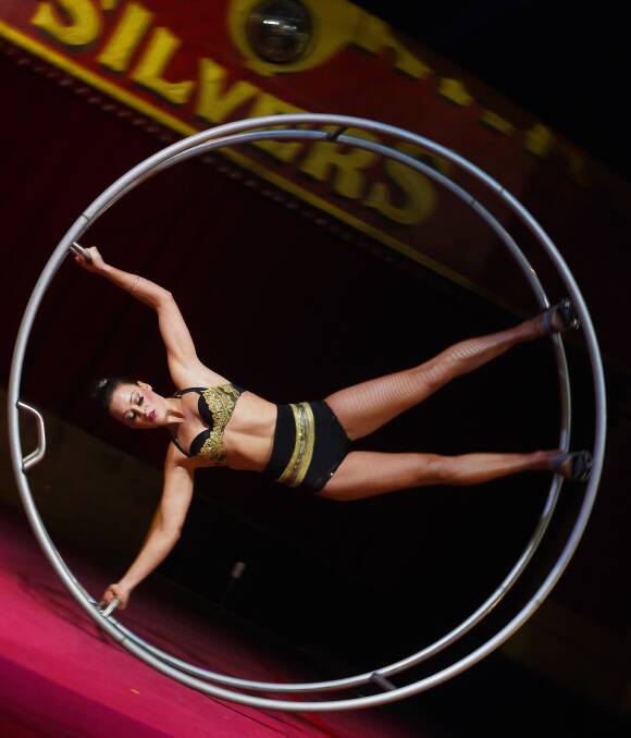 Astonishing balance: Emily Ryan performing on the German Wheel, which she has mastered and made her own. Regarded as a sport in Europe, she has made it into an art. Picture: Luka Kauzlaric