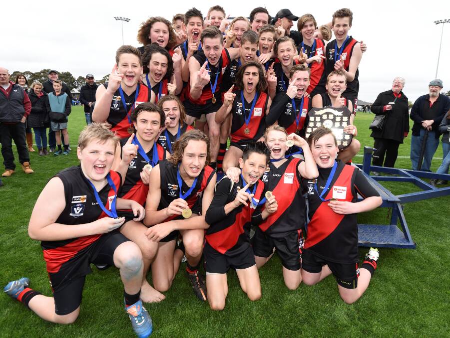 UNDEFEATED: Buninyong's under-15 football side celebrate what was a flawless season, undefeated as the champions of the league.