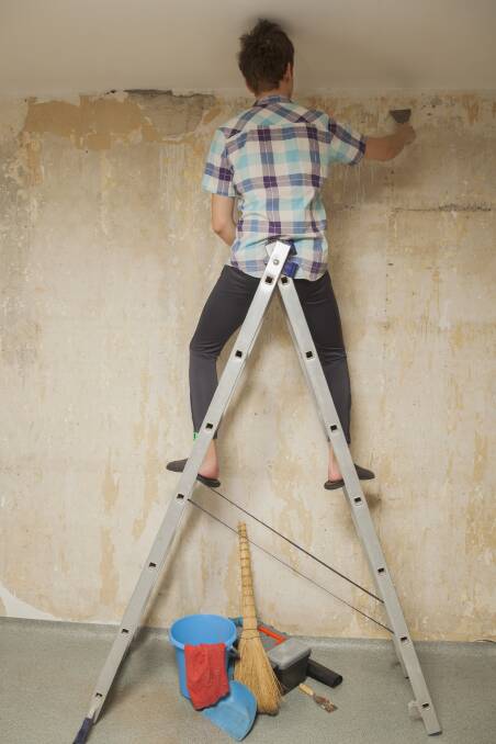 How NOT to safely use a ladder. File photo