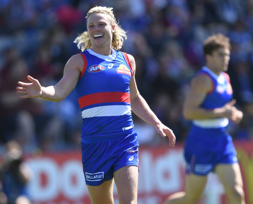 Western Bulldog Cody Weightman celebrates after kicking one of six goals against Gold Coast yesterday at Mars Stadium. Picture by Julian Smith/AAP
