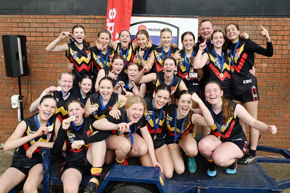 Bacchus Marsh Cobras celebrate winning the under-16 girls premiership. Picture by Kate Healy